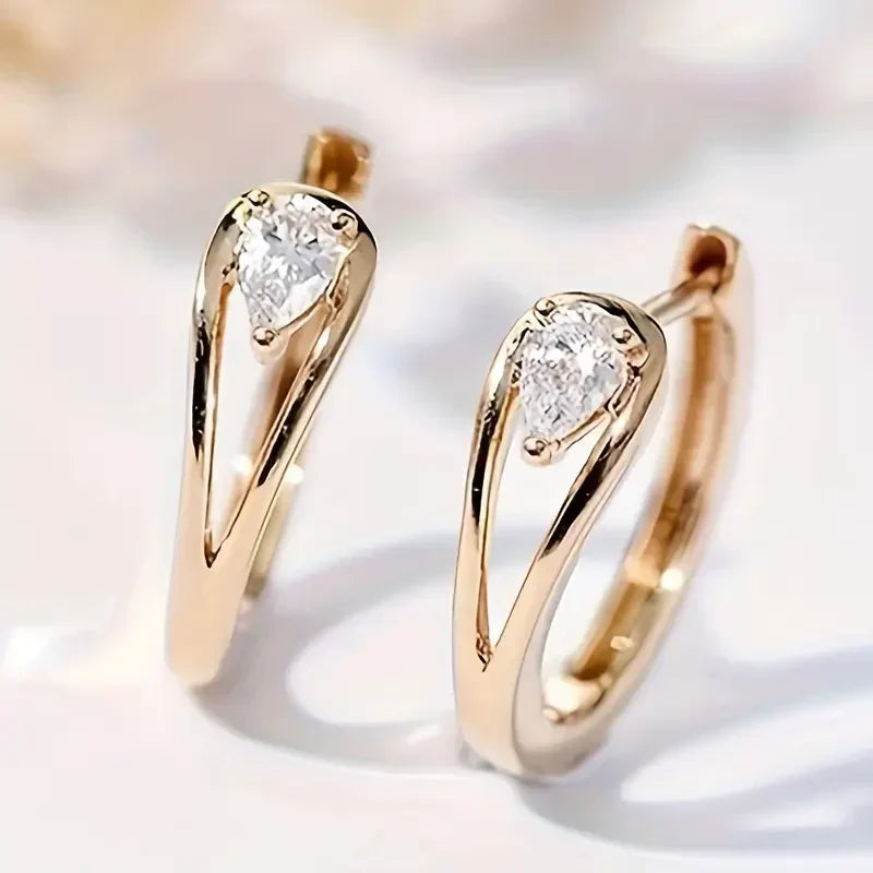 Stunning gold drop earrings in zirconia | Gold